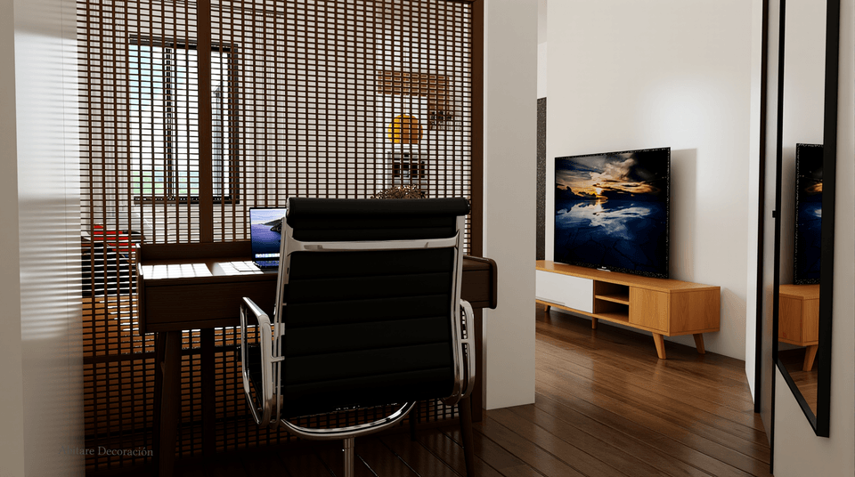 Zona de trabajo integrada junto al salón en vivienda de 53 m²